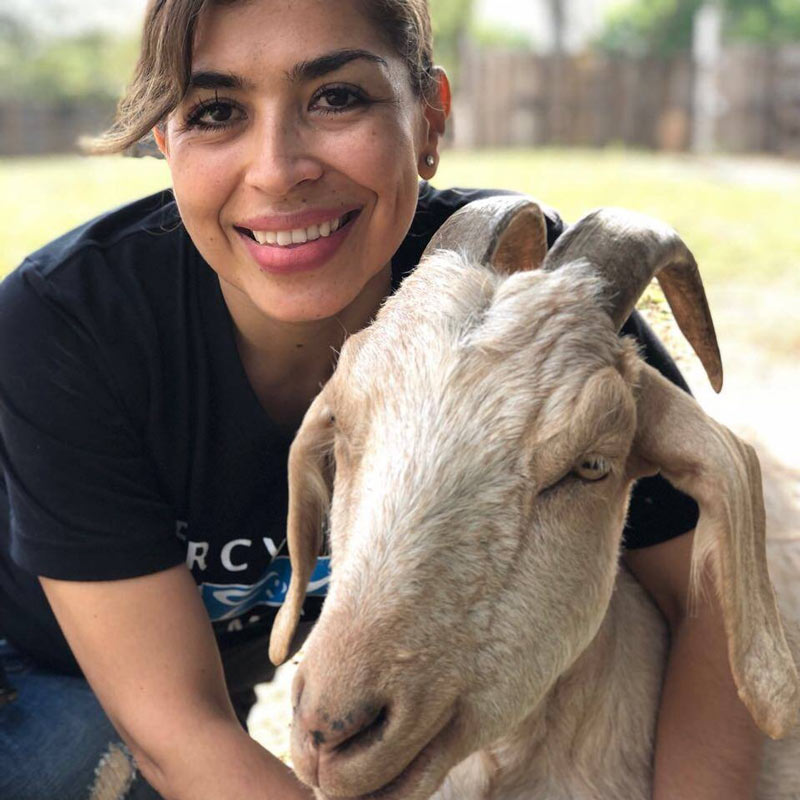 Eva with a goat